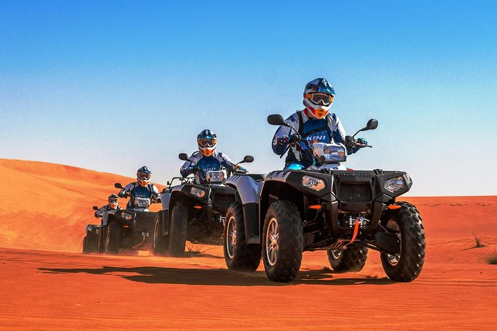Explore the stunning Arabian Desert on an exhilarating quad bike ride carving through sand dunes and experiencing the freedom of adventure complete with refreshments and a snack box for fuel.